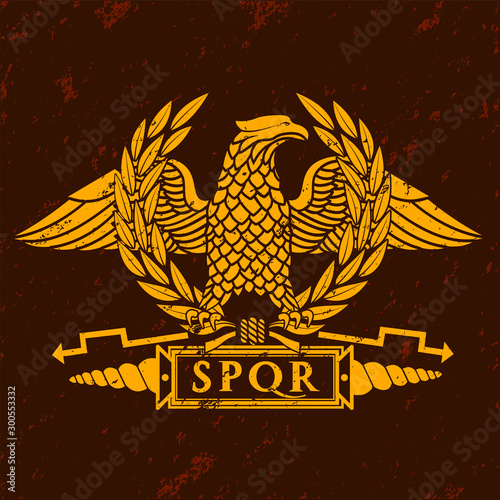 Roman eagle logo on old marble texture.
