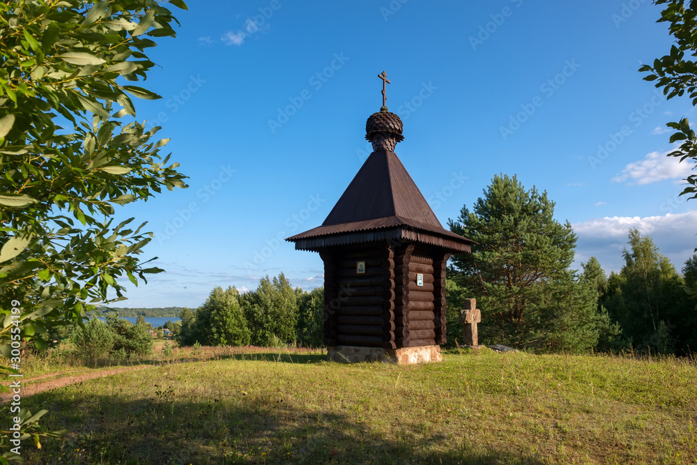 Wayside cross and chapel. Tver region, Russia. On the way from Varangians to Greeks