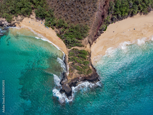 Top to down aerial view of a small cape dividing Little and Big beach at Make state park, Maui, Hawaii photo