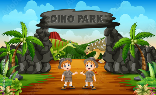 Zookeeper boy and girl on the dino park entrance