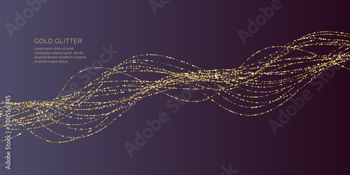 Gold glitter. Shiny particles on a dark background.