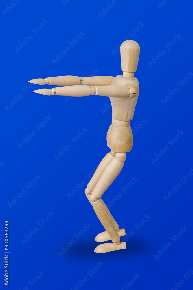 Sports wooden toy figure on blue Sports wooden toy figure on blue