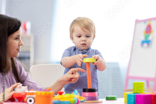 Cute woman and kid toddler ...