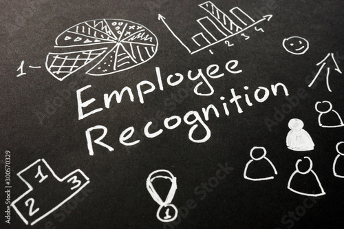Employee recognition inscription on the black sheet.