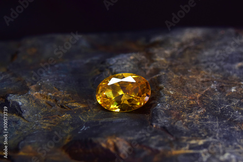Yellow gemstone is a natural gemstone that has been cut through Is an expensive gem