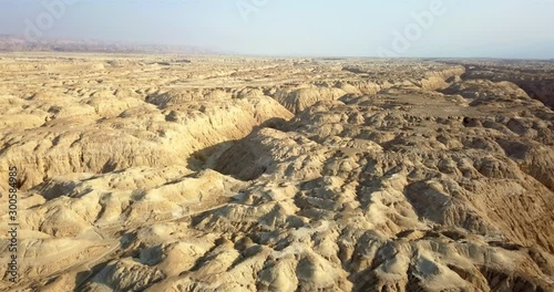 Aerial view over large Wadi with Soft sedimentary rock, Arava Desert Drone footage view over Wadi Amatzia Soft sedimentary rock, Arava Valley Isael photo