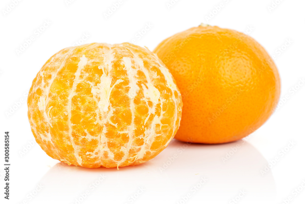 Group of two whole fresh orange mandarine isolated on white background Group of two whole fresh orange mandarine isolated on white background
