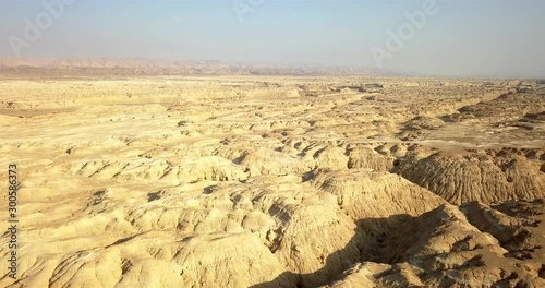 Aerial view over large Wadi with Soft sedimentary rock, Arava Desert Drone footage view over Wadi Amatzia Soft sedimentary rock, Arava Valley Isael photo