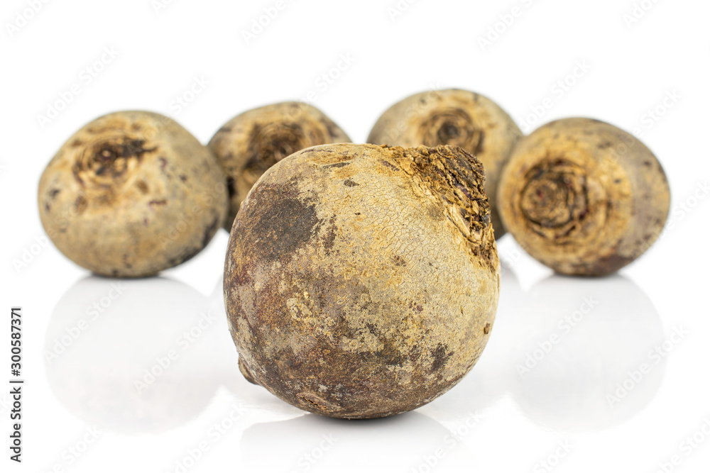 Group of five whole raw red beetroot isolated on white background Group of five whole raw red beetroot isolated on white background