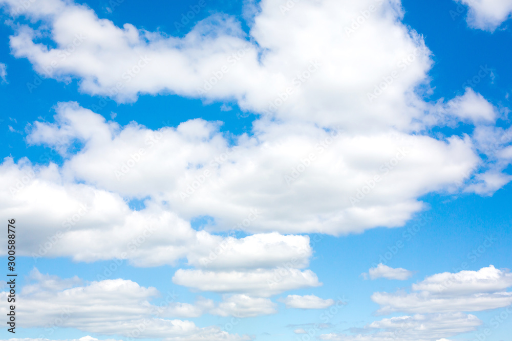 Obraz premium The blue sky is full of beautiful white clouds.