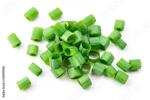 Green onion isolated. Heap of cut chives. Top view. photo
