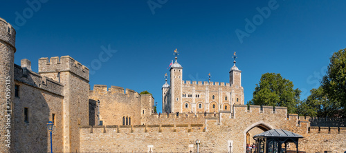 View of the Tower of London on a sunny day. Important building part of the Historic Royal Palaces housing the Crown Jewels