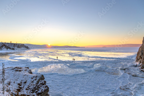 Fototapeta Naklejka Na Ścianę i Meble -  Colorful sunset over the crystal ice of Baikal lake