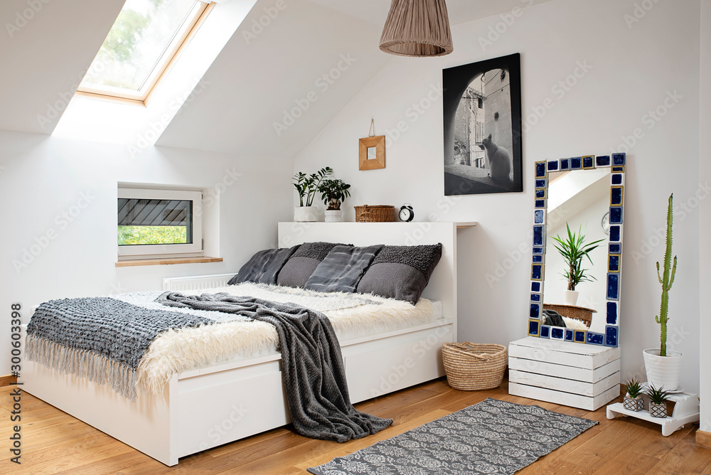 Grey outlet attic bedroom