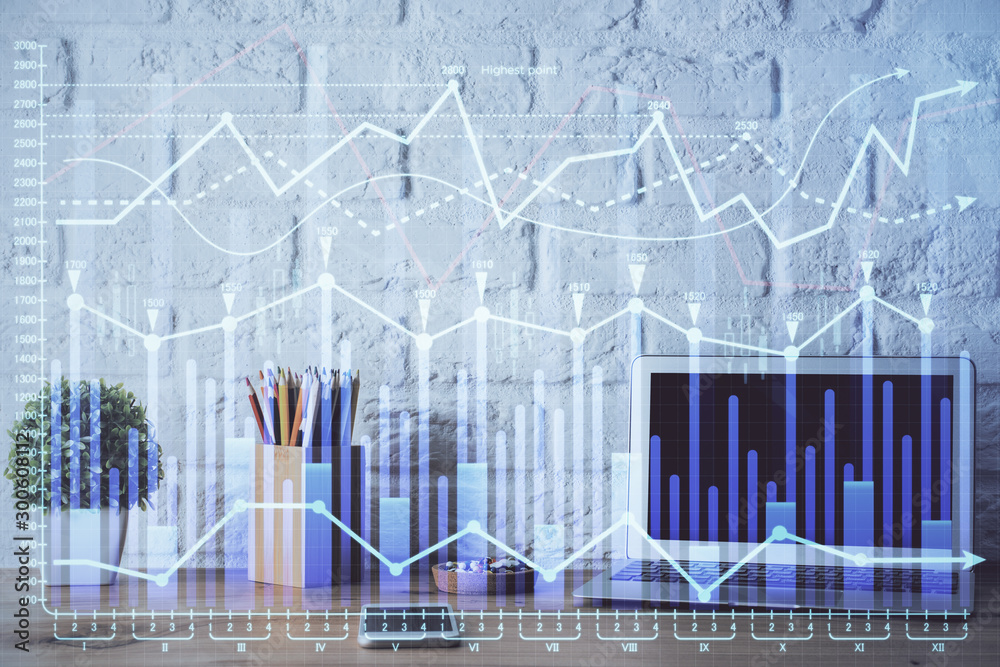 Double exposure of forex chart and work space with computer. Concept of international online trading. Double exposure of forex chart and work space with computer. Concept of international online trading.