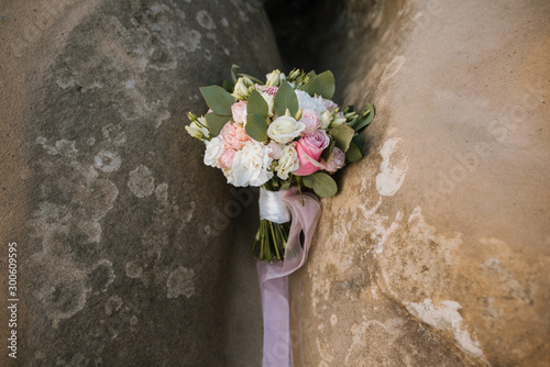 deautiful wedding bouquet with fresh flowers on a wedding day photo