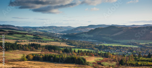 Panoramic view of Pitlochry in Perthshire, Scotland - heather covered hills, meandering river, mountains photo