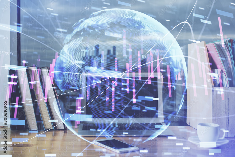 Forex Chart hologram on table with computer background. Double exposure. Concept of financial markets. Forex Chart hologram on table with computer background. Double exposure. Concept of financial markets.