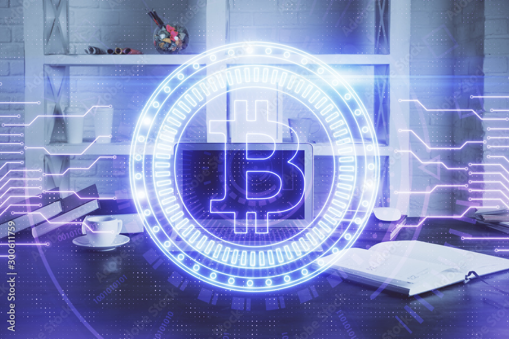 Multi exposure of blockchain theme hologram and table with computer background. Concept of bitcoin crypto currency. Multi exposure of blockchain theme hologram and table with computer background. Concept of bitcoin crypto currency.