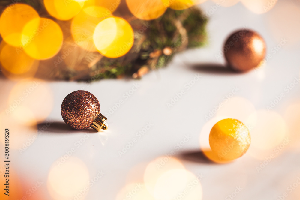 Fototapeta premium Christmas decorations for mood, toys, Christmas tree twig, lights. New Year