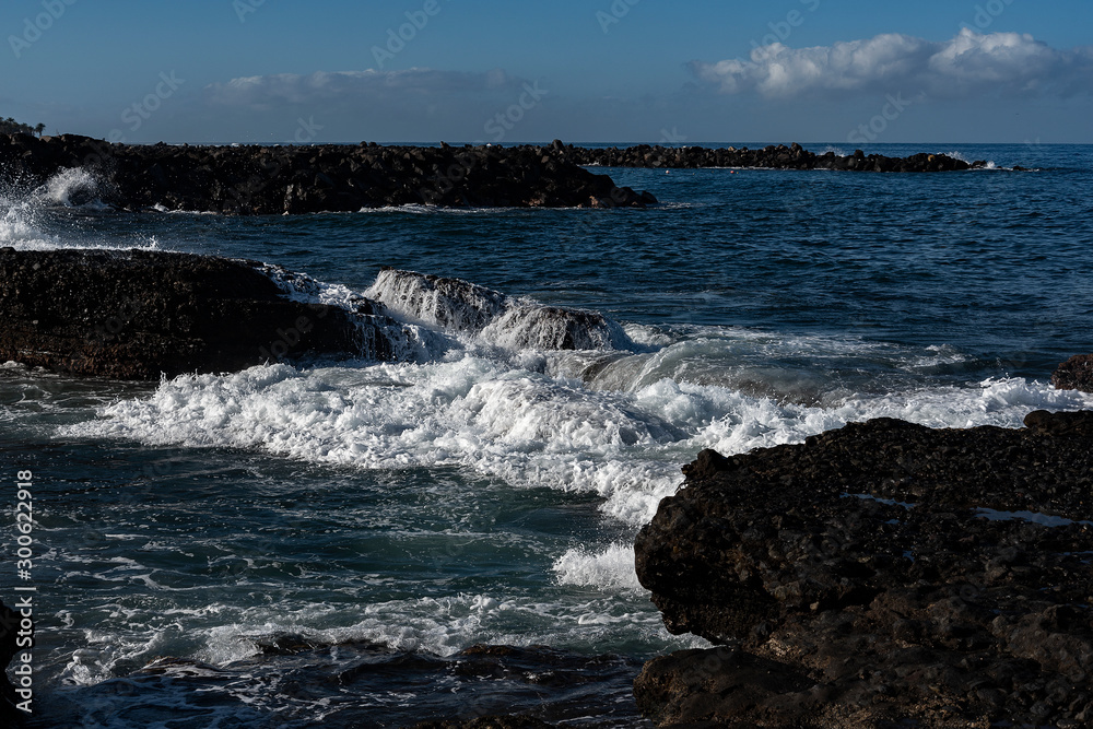 Splashing Atlantic ocean waves at Tenerife island coast.