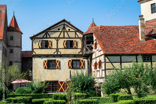 Another imposing building in the inner square of the beautiful Harburg Castle that looks like a fairy tale. Photography taken in Harburg, Bavaria, Germany photo