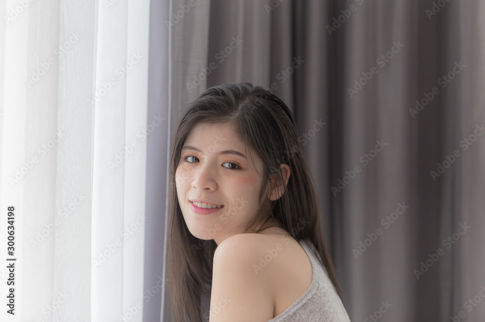 Sexy women doing various postures In the room by the window with soft white light Sexy women doing various postures In the room by the window with soft white light