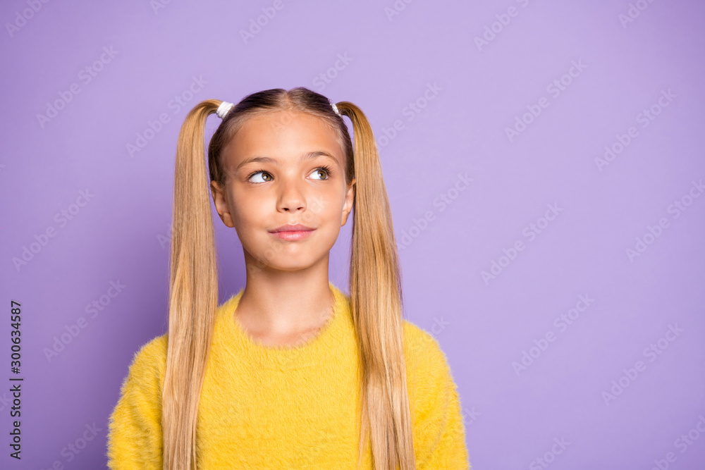 What decide. Portrait of minded positive cute child think thoughts plan her weekends look copyspace wear yellow sweater isolated over violet color background What decide. Portrait of minded positive cute child think thoughts plan her weekends look copyspace wear yellow sweater isolated over violet color background