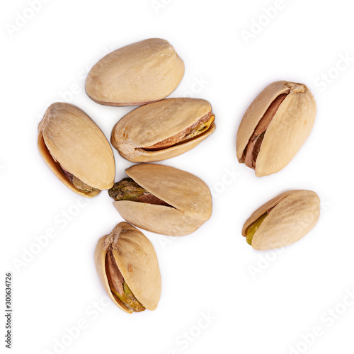 Wallpaper Mural Isolated pistachio nuts. Roasted salted pistachios. Top view Torontodigital.ca