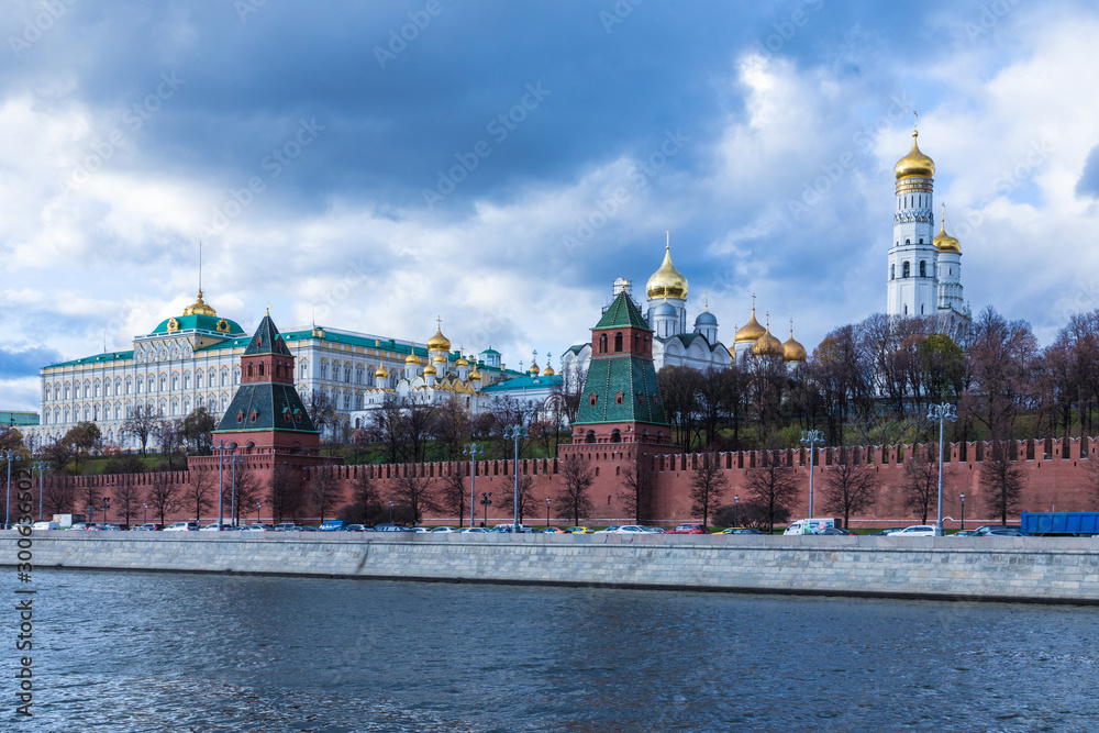Moscow Kremlin with Grand Kremlin Palace, the government residence of the president of Russia. View from the embankment of Moskva river. Day urban landscape in the cloudy autumn weather