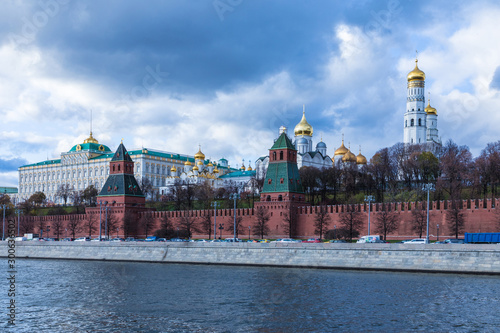 Moscow Kremlin with Grand Kremlin Palace, the government residence of the president of Russia. View from the embankment of Moskva river. Day urban landscape in the cloudy autumn weather © Майджи Владимир