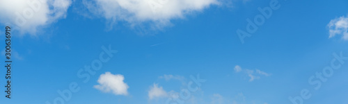 Photography Blue sky with clouds and airplane track (wide background panorama)