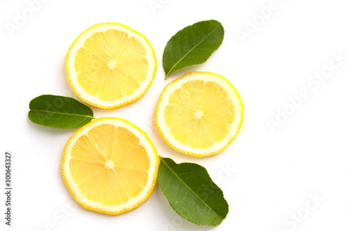  fresh lemon and green leave fruit flat lay food concept isolate on white background