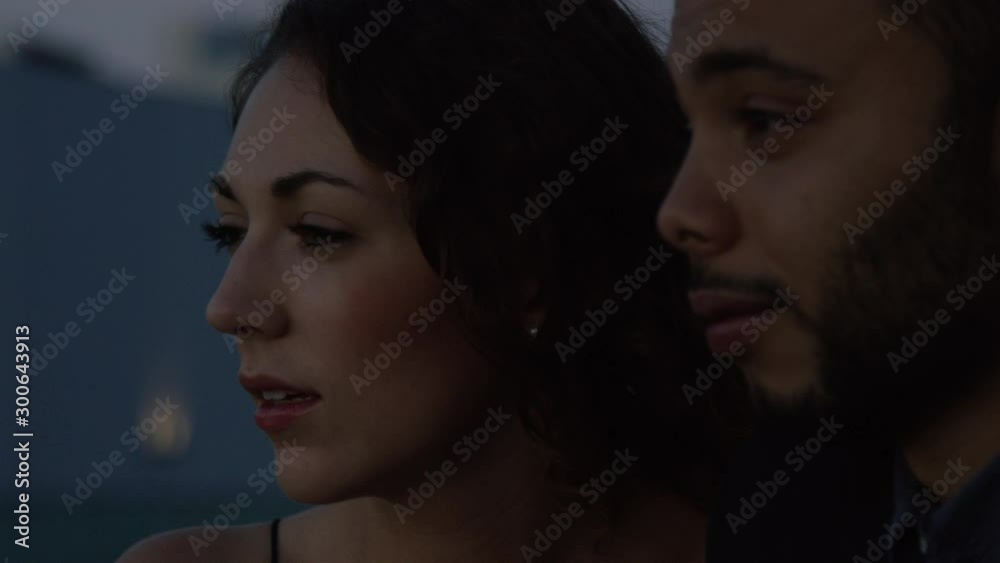 Closeup of African American Man and Caucasian Woman Staring Out At The City On A Date In Slow Motion Closeup of African American Man and Caucasian Woman Staring Out At The City On A Date In Slow Motion