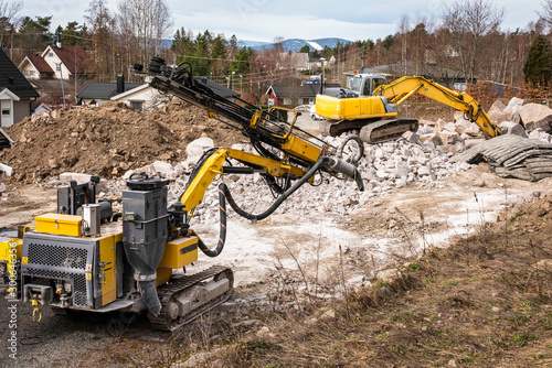 Excavator and drilling machnes photo