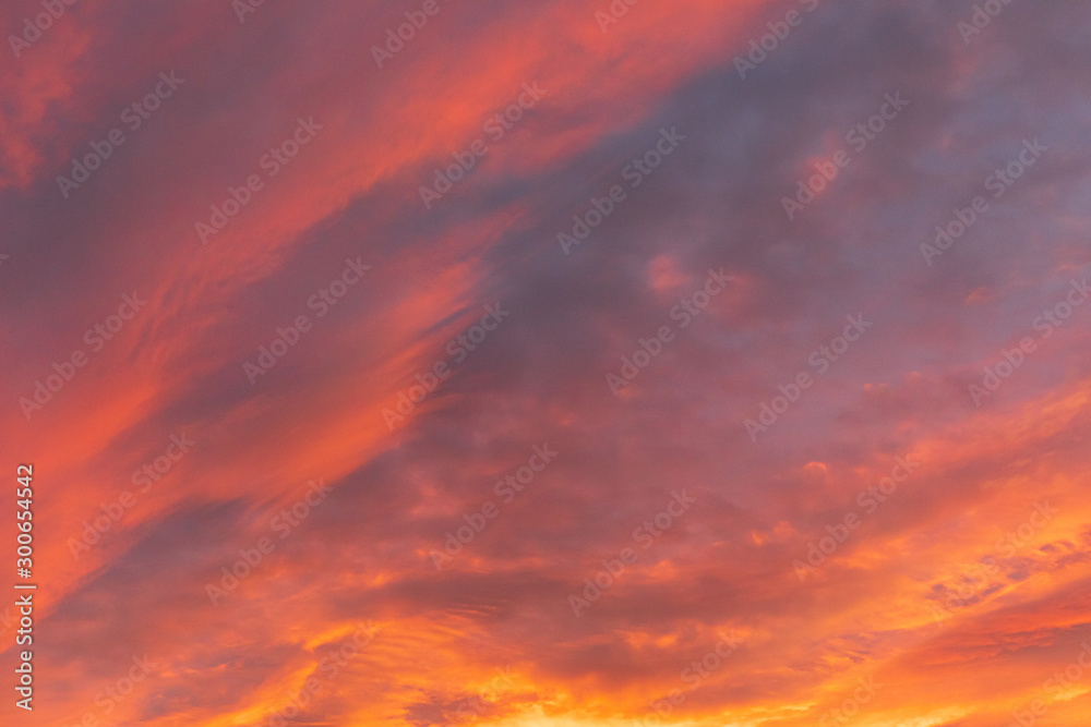 Dramatic fiery sky sunset cloudscape at dusk