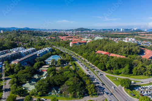 Aerial drone image of beautiful rural town local lifestyle houses residential of Menggatal Town, Sabah, Malaysia © alenthien