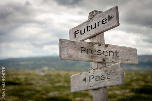 Photo Future, present, past signpost