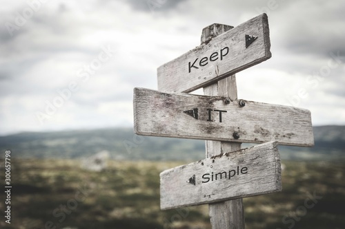 Keep it simple signpost. Nature, adventure, message, text, quote concept. photo