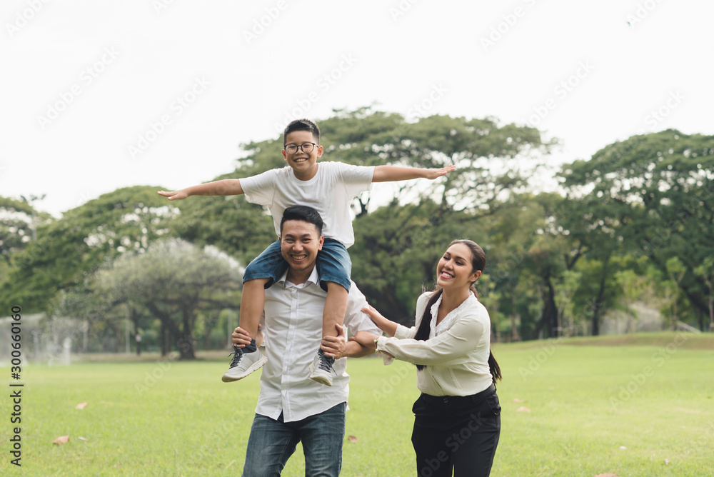 happy family in the park, family asian group relation quality healthy support, home park . happy family in the park, family asian group relation quality healthy support, home park .