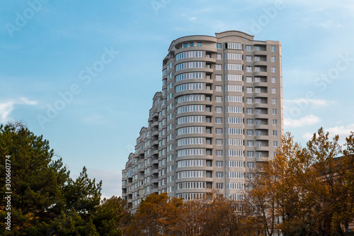 New apartment building in the autumn park