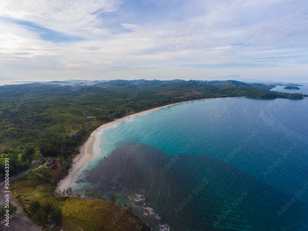 Aerial drone image of Beautiful white sandy beach with turquoise sea water beach at Kudat, Sabah, Borneo Aerial drone image of Beautiful white sandy beach with turquoise sea water beach at Kudat, Sabah, Borneo