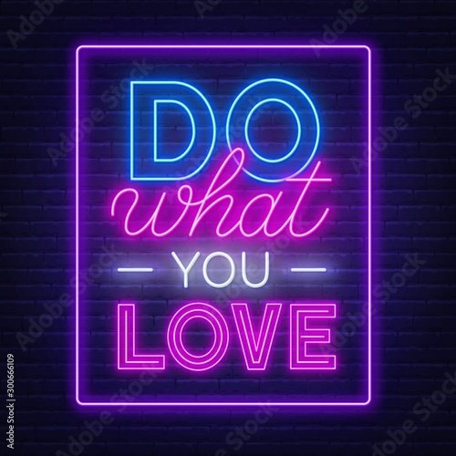 Do what you love neon lettering. Neon sign on brick wall background.