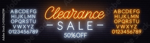 Clearance sale neon sign on dark background. Neon alphabet on a dark background. Template for design.
