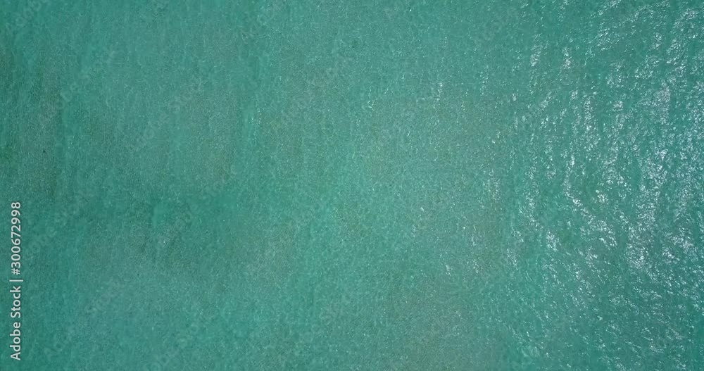 Clear crystal emerald water of lagoon creating a beautiful minimalist texture for copy space Clear crystal emerald water of lagoon creating a beautiful minimalist texture for copy space