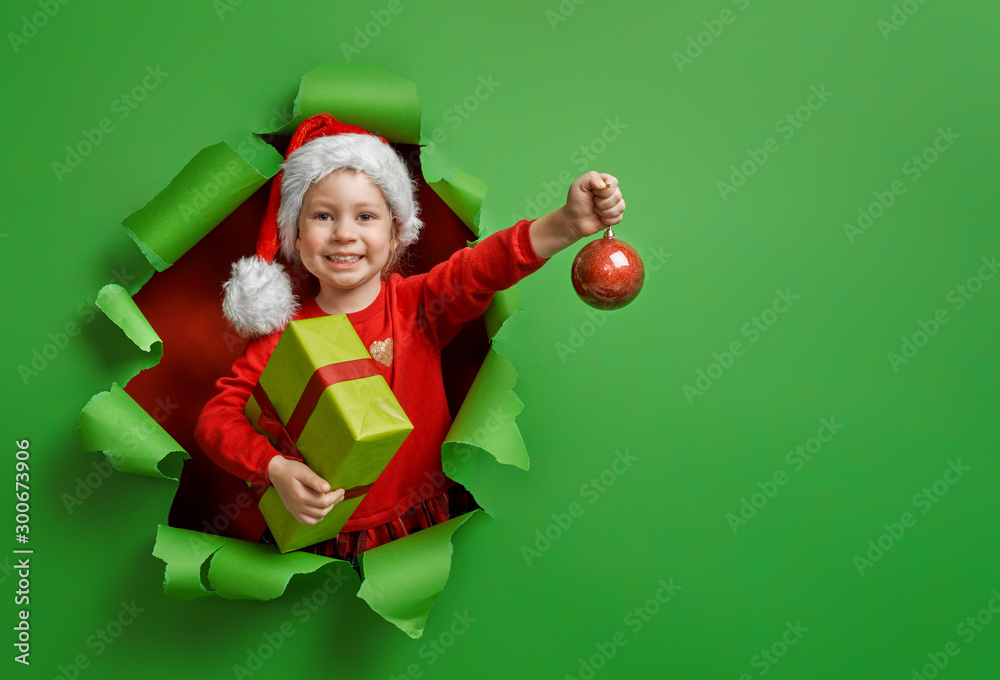 girl with Christmas gift. - obrazy, fototapety, plakaty 