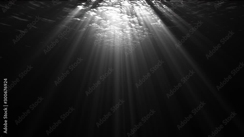 Rays of Sunlight Penetrate Clear Water, Air Bubbles Rise to the Surface. Rays of Sunlight Penetrate Clear Water, Air Bubbles Rise to the Surface.