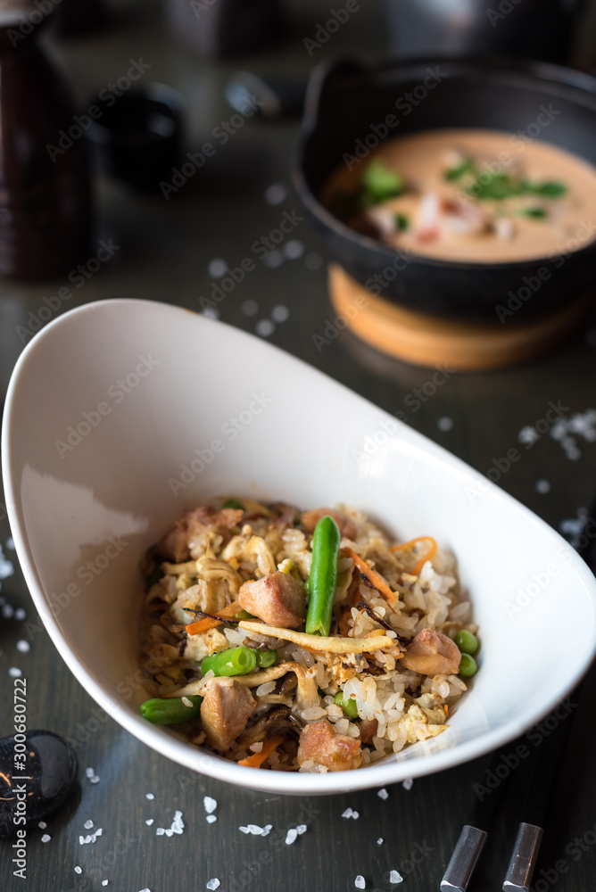 Chicken and Vegetable Fried Rice. Dark Background. Chicken and Vegetable Fried Rice. Dark Background.