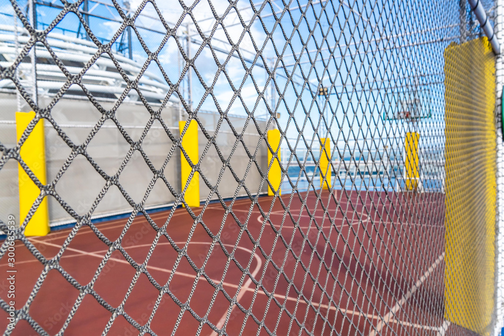 Basket Ball court with mesh wire protection with blue background for street  city sport active concept background and backdrop. Photos | Adobe Stock