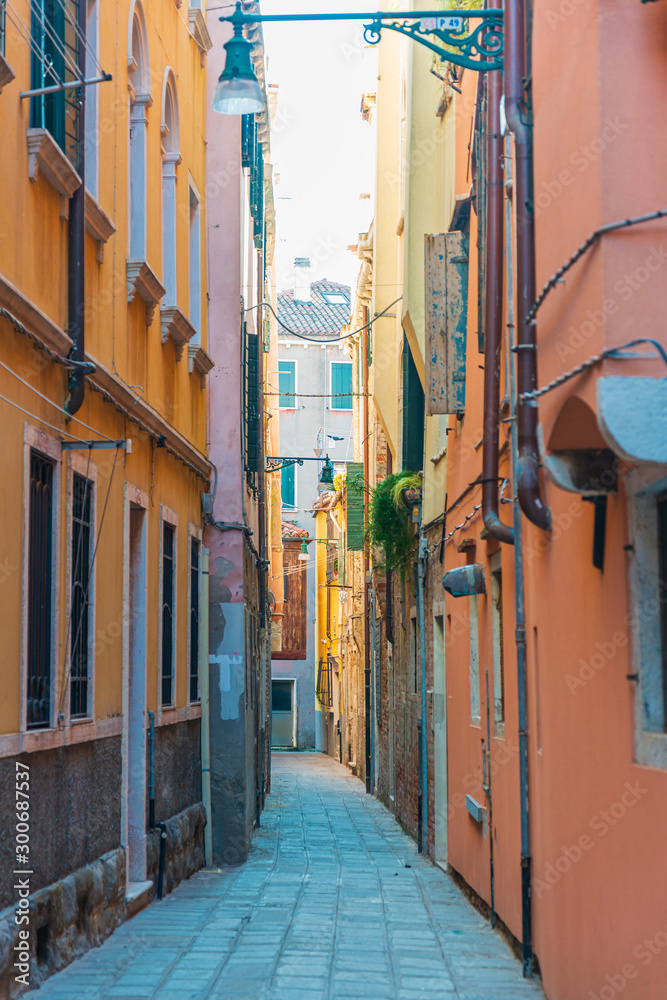Fototapeta premium VENICE, ITALY - December 21, 2017 : street view of old buildings in Venice, ITALY